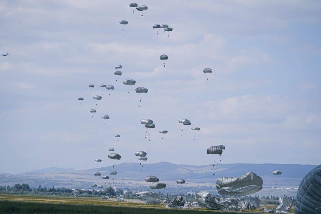 <em>Paratroopers of the 173rd Airborne land at a DZ in Vaziani Training Area, Georgia (U.S. Army)</em>