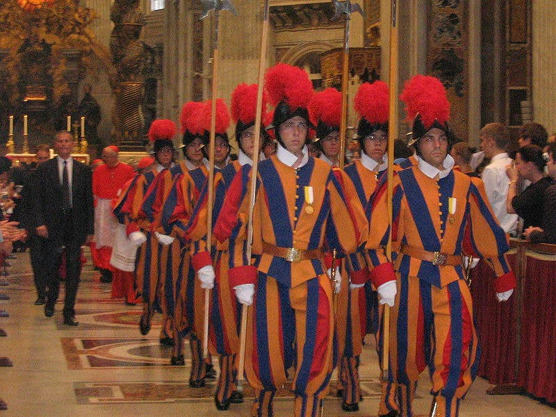 A group of Swiss guards after a celebration inside St. Peter Dome, 29 June 2006. (Wikimedia Commons)