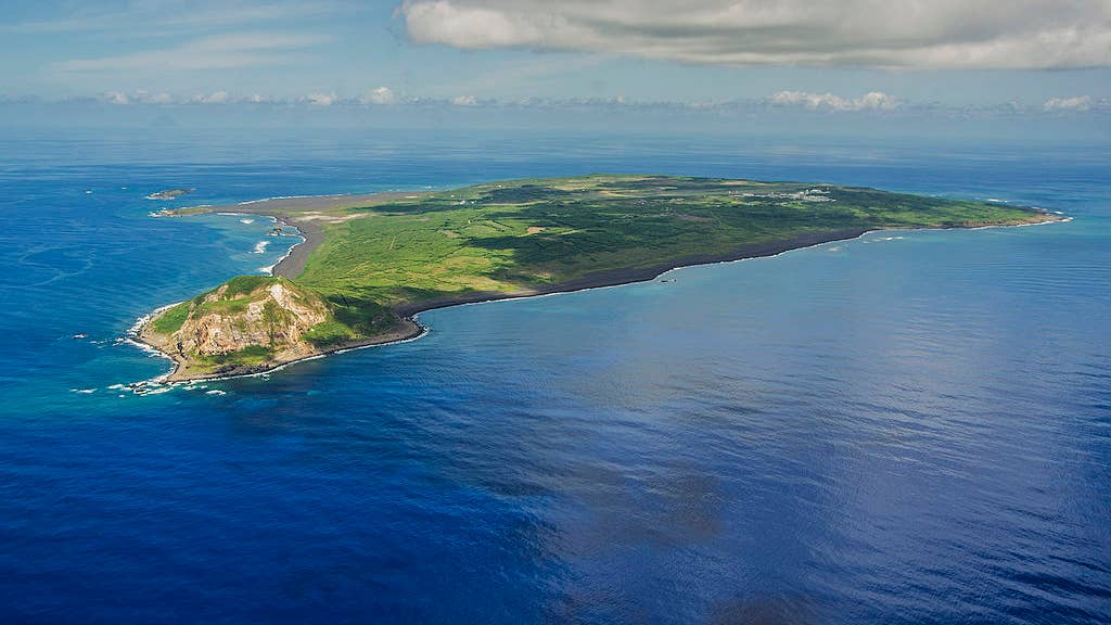 An aerial photo of the island of Iwo To, formerly known as Iwo Jima. The Battle of Iwo Jima was the largest sustained aerial offensive of the Pacific theater of World War II. The U.S. sent more than 70,000 service members from the Navy and Marine Corps and 450 ships in what became one of the largest invasion forces of the Pacific campaign. (U.S. Navy photo)