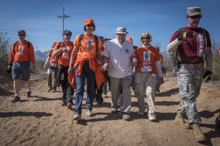 <em>Skardon (center, white shirt) covered 8.5 miles of the Bataan Memorial Death March in his best time of 4 hours, 2 minutes in 2016 (Clemson University)</em>