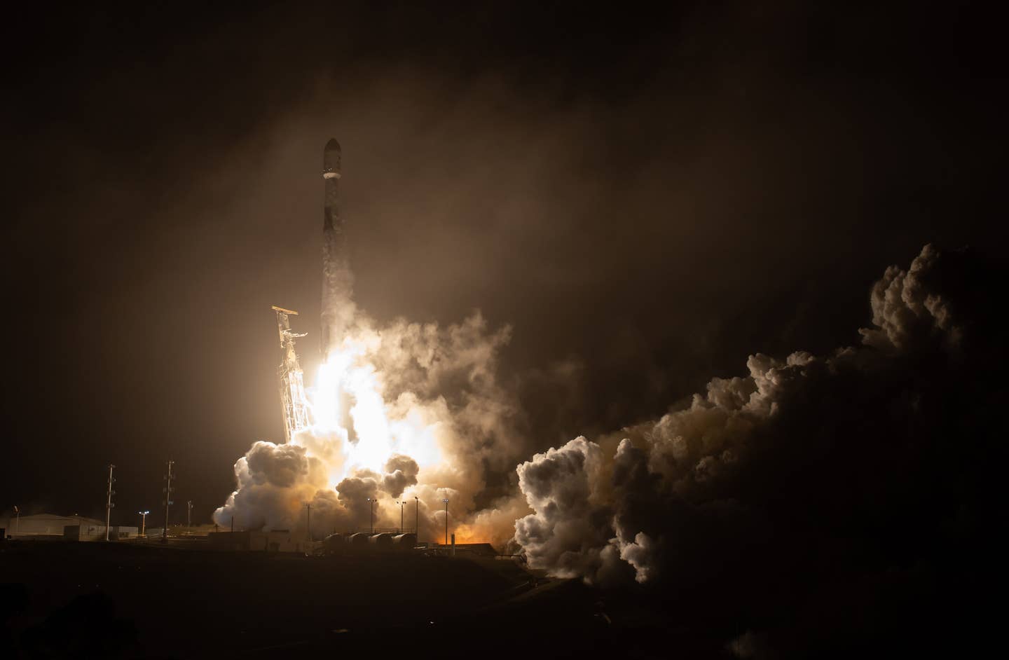 The SpaceX Falcon 9 rocket launches with the Double Asteroid Redirection Test, or DART, spacecraft onboard, Tuesday, Nov. 23, 2021, Pacific time (Nov. 24 Eastern time) from Space Launch Complex 4E at Vandenberg Space Force Base in California. DART is the world’s first full-scale planetary defense test, demonstrating one method of asteroid deflection technology. The mission was built and is managed by Johns Hopkins APL for NASA’s Planetary Defense Coordination Office. Photo Credit: (NASA/Bill Ingalls)