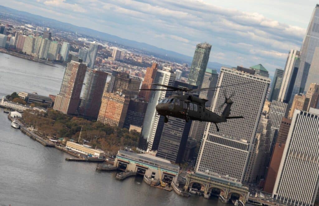 <em>A New York Army National Guard UH-60 flies the Army leaders over lower Manhattan during the five-day class (U.S. Army)</em>