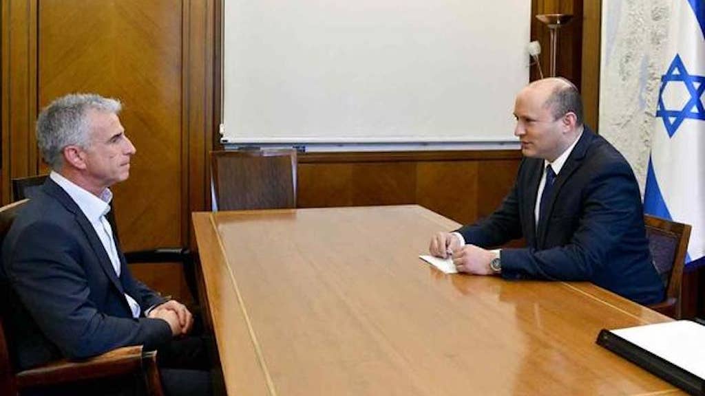 Prime Minister Naftali Bennett (right) holds his first working meeting at the Prime Minister's Office in Jerusalem, with Mossad Director David Barnea (left), June 3, 2021. (Office of the Israeli Prime Minster)