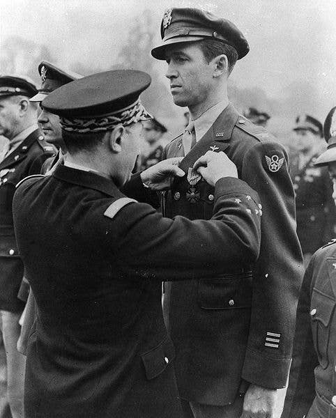 Colonel Stewart receiving the <a href="https://en.wikipedia.org/wiki/Croix_de_Guerre">Croix de Guerre</a> with Palm in 1944. (USAF photo)
