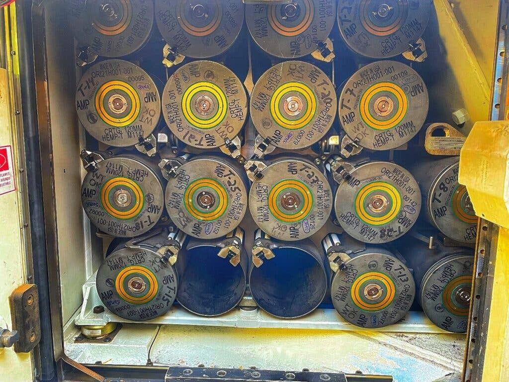<em>Nearly a complete combat load of AMP rounds in the ammo rack of an M1A2 Abrams (U.S. Army)</em>
