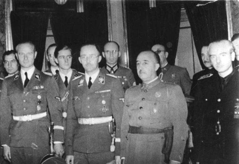 Franco with <a href="https://en.wikipedia.org/wiki/Karl_Wolff">Karl Wolff</a>, <a href="https://en.wikipedia.org/wiki/Heinrich_Himmler">Heinrich Himmler</a> and <a href="https://en.wikipedia.org/wiki/Ramon_Serrano_Suner">Serrano-Suñer</a> in 1940.