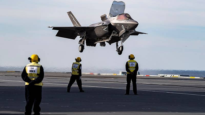 A British Lockheed Martin F-35B Lightning (s/n ZM148) of No. 617 Squadron RAF lands aboard the Royal Navy aircraft carrier HMS Queen Elizabeth (R08) in the Atlantic Ocean on 17 October 2019. (U.S. Navy photo)
