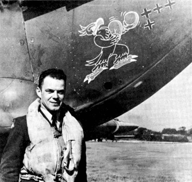 first American ace of WWII dunn next to his plane