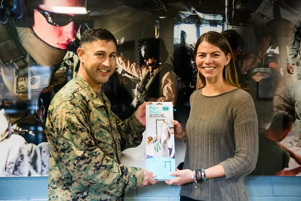 April Mitchell, entrepreneur, speaks with Marines at Wounded Warriors Battalion - West on Marine Corps Base Camp Pendleton, California, Nov. 15, 2019. Mitchell, a military spouse, created a new door hook in hopes of giving individuals with less mobility more independence. Mitchell is a native of Lake Mills, Wisconsin. (U.S. Marine Corps photo by Lance Cpl. Alison Dostie)
