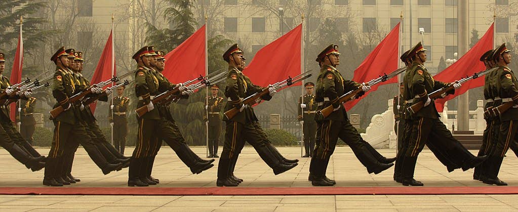 Members of a Chinese military honor guard march during a welcome ceremony for Chairman of the Joint Chiefs of Staff Marine Gen. Peter Pace at the Ministry of Defense in Beijing, China. (U.S. Air Force photo)