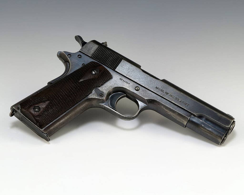 A government-issue <a href="https://en.wikipedia.org/wiki/M1911_pistol">M1911 pistol</a> manufactured in 1914. (Wikimedia Commons)