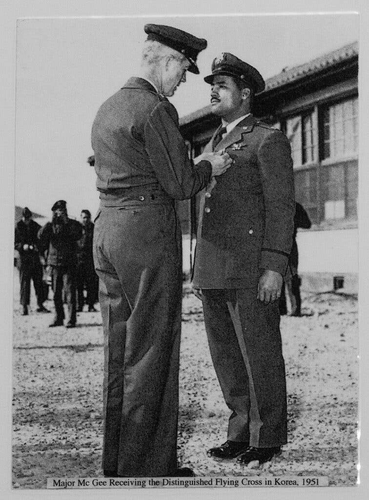 <em>McGee receives the Distinguished Flying Cross during the Korean War (Public Domain)</em>