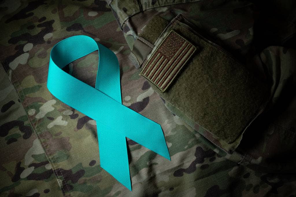 <em>A teal ribbon is the national symbol of support for sexual assault victims (U.S. Air Force)</em>