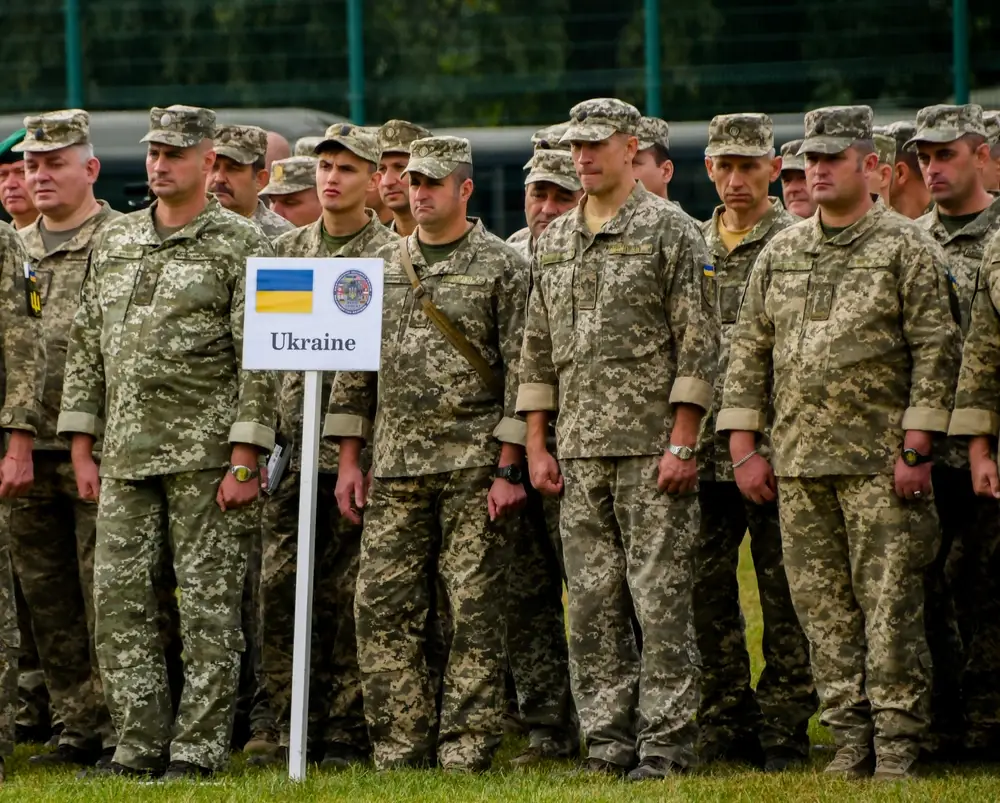 Ukraine stands in formation for the opening ceremony of Rapid Trident in International Peacekeeping and Security Centre, Yavoriv, Ukraine, Sept. 3 2018. Rapid Trident is a Ukrainian-led exercise with multinational support consisting of 14 allied and partner nations. (U.S. Army National Guard photos by Army Pfc. Andrea Torres)