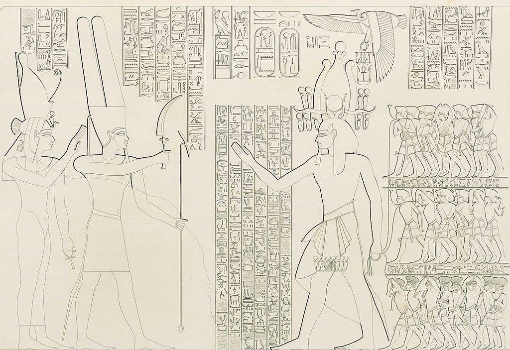 Medinet Habu Second Pylon, showing wide view and a close-up sketch of the left-hand side relief in which Amon, with Mut behind him, extends a sword to Rameses III who is leading three lines of prisoners.