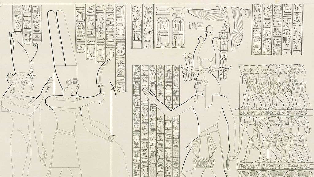 Medinet Habu Second Pylon, showing wide view and a close-up sketch of the left-hand side relief in which Amon, with Mut behind him, extends a sword to Rameses III who is leading three lines of prisoners.
