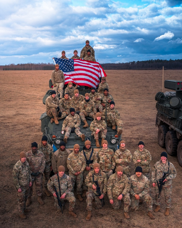 POLAND, 02.25.2022<br>Photo by Maj. Robert Fellingham, 10th Army Air and Missile Defense Command<br>U.S. Army Soldiers, assigned to 5th Battalion, 4th Air Defense Artillery Regiment, pose on their Maneuver Short Range Air Defense Stryker at Exercise Saber Strike 22 at BPTA, Poland on February 25, 2022. This is the exercise debut of the four prototype M-SHORAD platforms. The exercise runs through March with approximately 13,000 participants from 13 countries. Saber Strike has been held every 2 years since 2010.