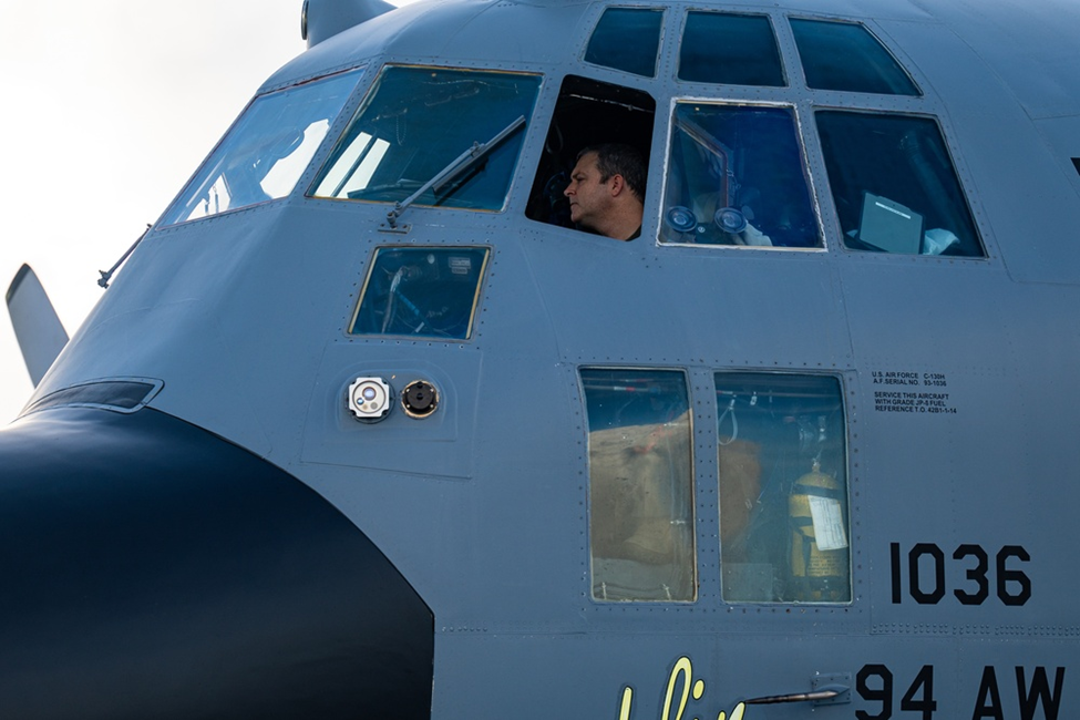 ANDERSEN AIR FORCE BASE, GUAM, 02.04.2022<br>Photo by Master Sgt. Joey Swafford,<br>U.S. Air Force Reserve Maj. Brandon Calhoun, a C-130H Hercules pilot assigned to the 700th Airlift Squadron, prepares a C-130H for an airdrop mission during exercise Cope North 22 at Andersen Air Force Base, Guam, Feb. 5, 2022. CN22 focused on humanitarian assistance and/or disaster relief operations and helped improve collaboration between the U.S. Armed Forces, Royal Australian Air Force and the Japan Air Self-Defense Force.