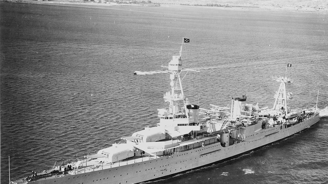 USS Houston (CA-30), off San Diego, California, in October 1935, with President Franklin D. Roosevelt on board. She is flying an admiral's four-star flag at her foremast peak, and the Presidential flag at her mainmast peak.