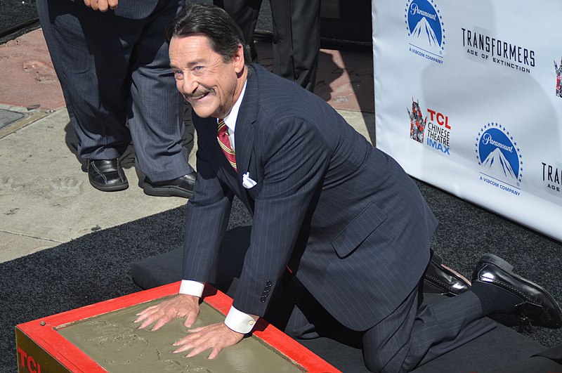Cullen putting his handprints in wet concrete at the Optimus Prime Chinese Theatre Handprint Ceremony in September 2014.