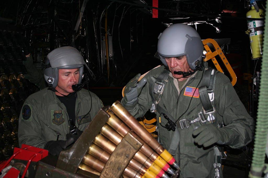 Ermey loading ammunition for the Bofors 40 mm gun aboard a Lockheed AC-130H "Spectre" Gunship in 2006.