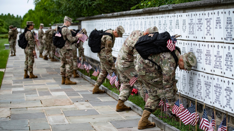Old Guard soldiers place the flags at Arlington National Cemetery – Memorial Day 2022