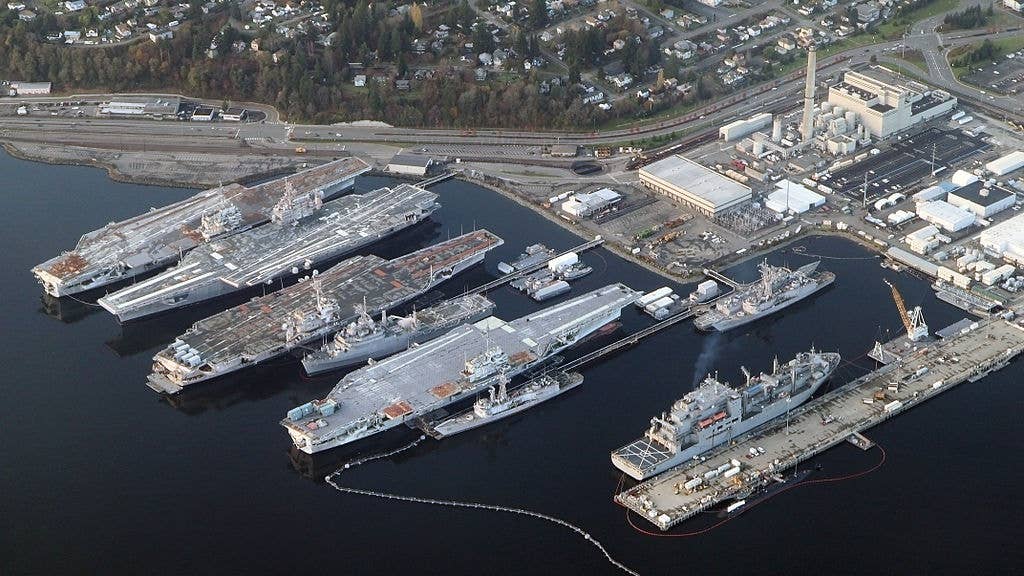 Aircraft carriers stored in Bremerton (part of Naval Base Kitsap) in 2012. From left to right: Independence, Kitty Hawk, Constellation and Ranger. (Wikipedia)