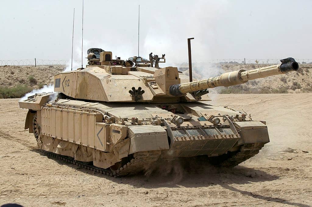 A Challenger 2 tank patrolling outside Basra, Iraq, during Operation Telic.