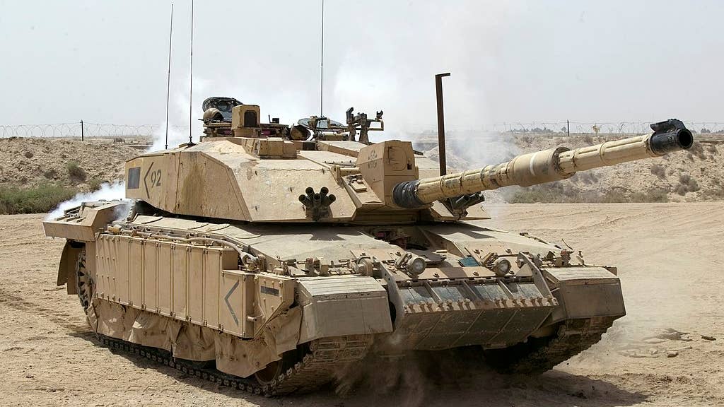 A Challenger 2 tank patrolling outside Basra, Iraq, during Operation Telic.