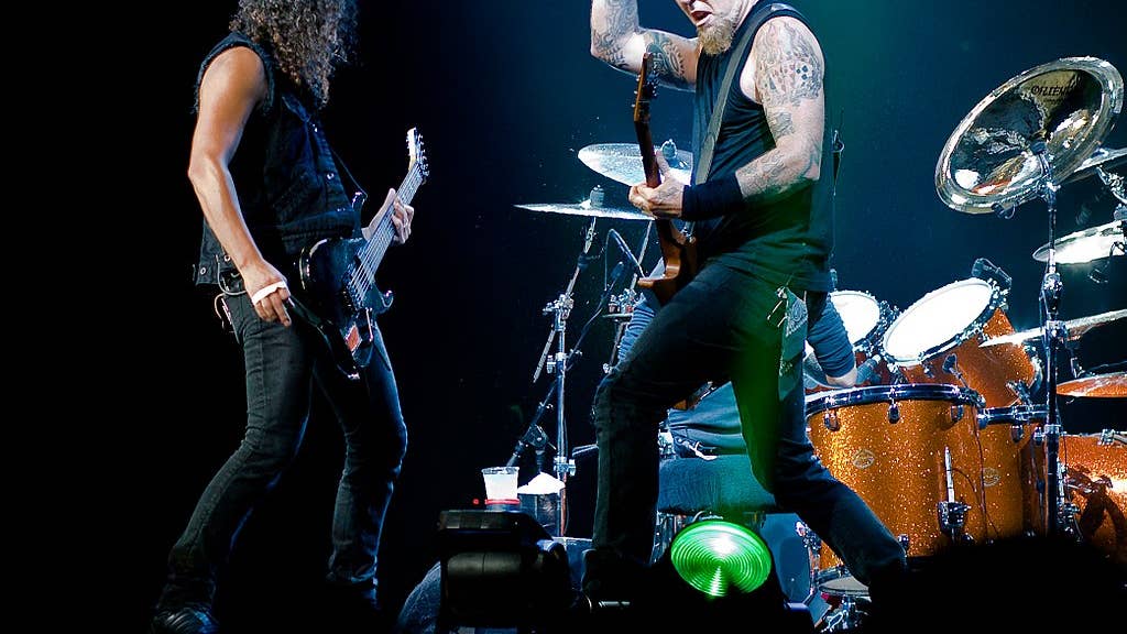  Kirk Hammett and James Hetfield playing at Metallica show at The O2 Arena, London, England.