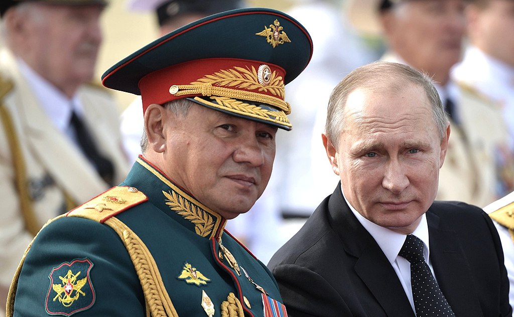 Vladimir Putin (right) and his long-time confidant Defence Minister Sergei Shoigu.
