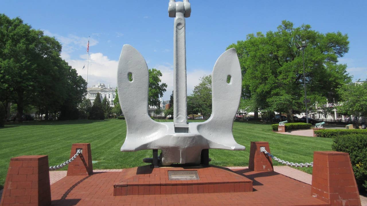 One ship’s anchor from USS Enterprise (CV-6). This is a standard US Navy stockless anchor. It is all metal and painted grey. Its estimated  weight is 25,000 pounds.  (history.navy.mil)