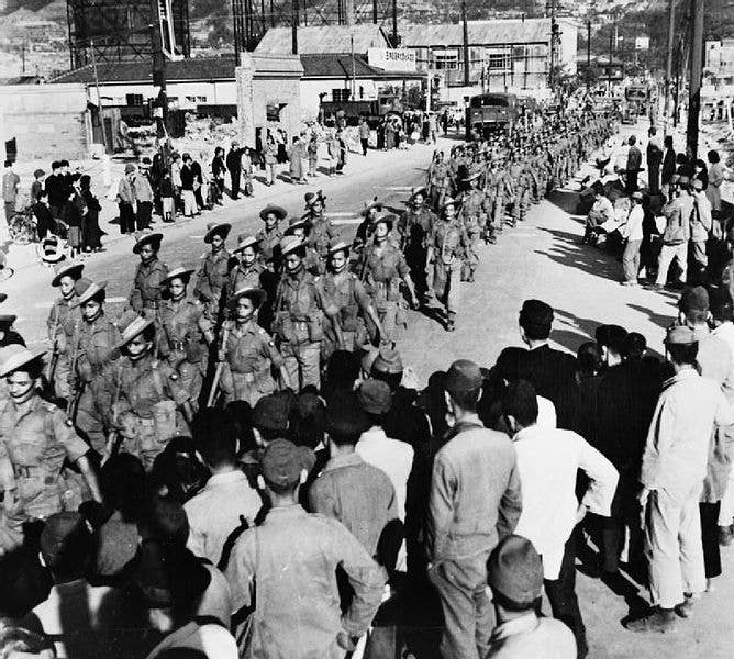 The 2/5th Royal Gurkha Rifles marching through Kure soon after their arrival in Japan in May 1946 as part of the Allied forces of occupation.