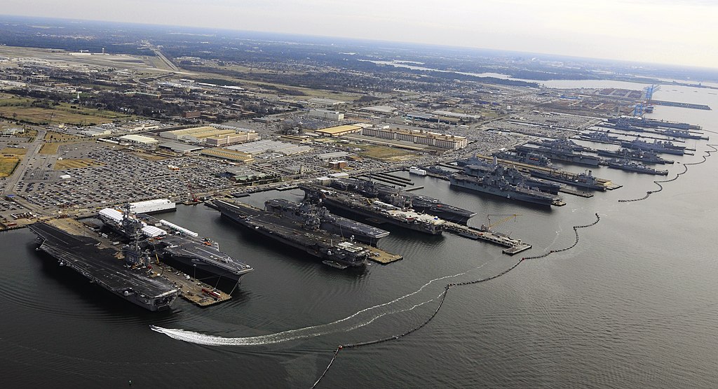 Various destroyers, replenishment oilers, cruisers, submarines, frigates, aircraft carriers and some other ships and an amphibious assault ship in Naval Station Norfolk. Pictured December 20, 2012.