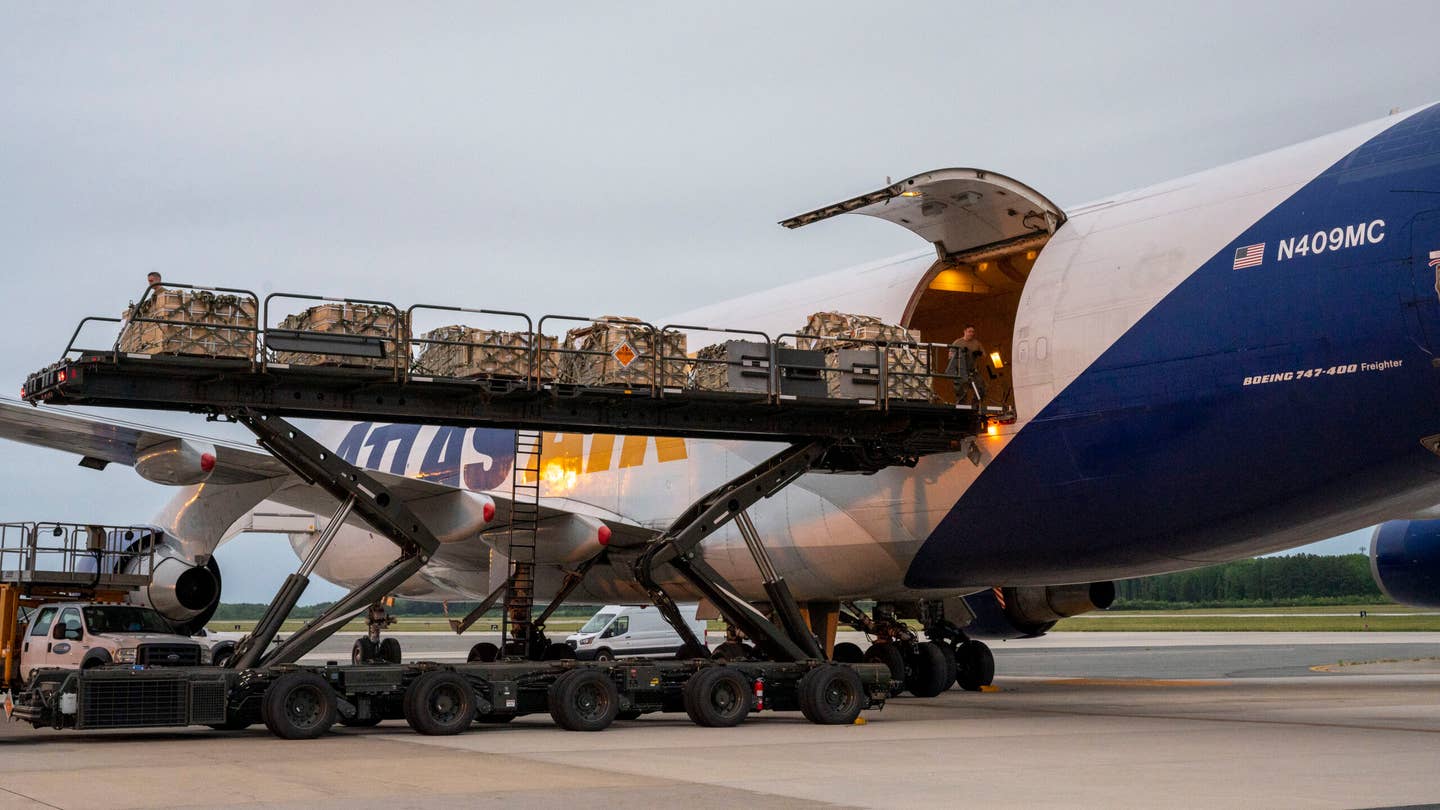 Airmen from the 436th Aerial Port Squadron load cargo onto an aircraft in support of a security assistance mission between the U.S. and Ukraine at Dover Air Force Base, Delaware, May 24, 2021. The U.S. and Ukraine first initiated a partnership in 1993. Missions such as this demonstrate the U.S.’s commitment to Ukraine’s independence, sovereignty and territorial integrity. (U.S. Air Force photo by Airman 1st Class Cydney Lee)