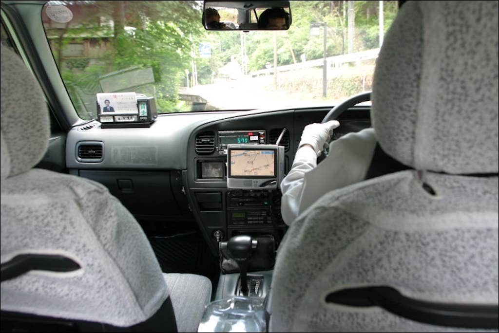 Automotive navigation system in a taxicab. (Public domain)