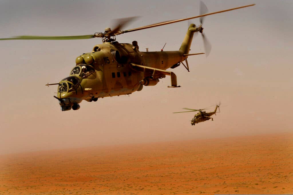 <em>Mi-35 Hinds over Afghanistan during a US-led training sortie (U.S. Air Force)</em>
