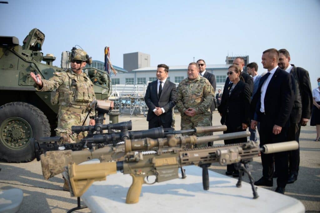 <em>Ukrainian President Volodymyr Zelensyy attends a tactical equipment demonstration at Moffett Air National Guard Base, California, Sept. 2, 2021 (U.S. Air National Guard)</em>