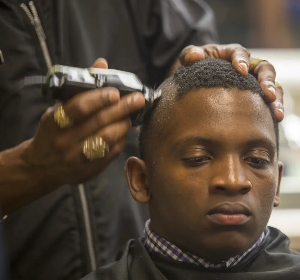 A recruit with Delta Company, 1st Recruit Training Battalion, gets his grape cut upon the first hours of arrival at Marine Corps Recruit Depot Parris Island, S.C. (U.S. Marine Corps photo by Lance Cpl. Samuel C. Fletcher)