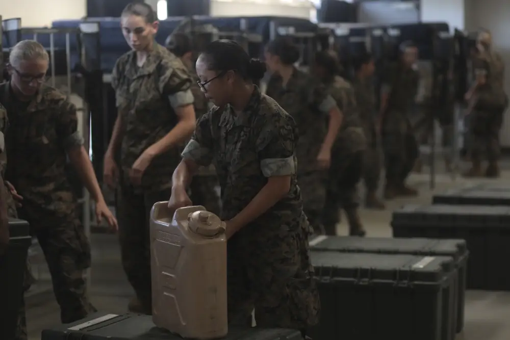 Recruits with Oscar Company, 4th Recruit Training Battalion, Platoon 4042, stage gear on Marine Corps Recruit Depot Parris Island, S.C., Sept. 6, 2019. Recruits were evacuated off of Parris Island on Sept. 3, 2019 due to potential hazards from hurricane Dorian and returned to training after receiving the all-clear. (U.S. Marine Corps Photo by Lance Cpl. Shane T. Manson)