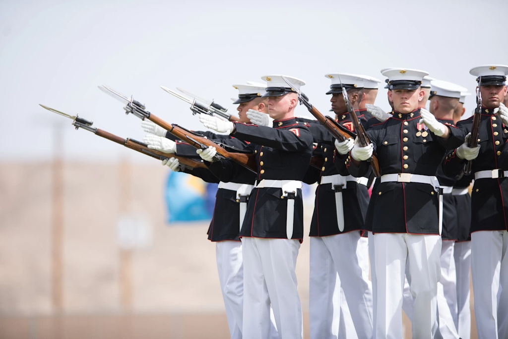 Marines of the Silent Drill Team perform rifle maneuvers aboard Marine Corps Logistics Base Barstow on March 11. The Silent Drill Team, Marine Drum and Bugle Corps, and Marine Corps Color Guard performed at MCLB Barstow as part of their West Coast performance tour.
