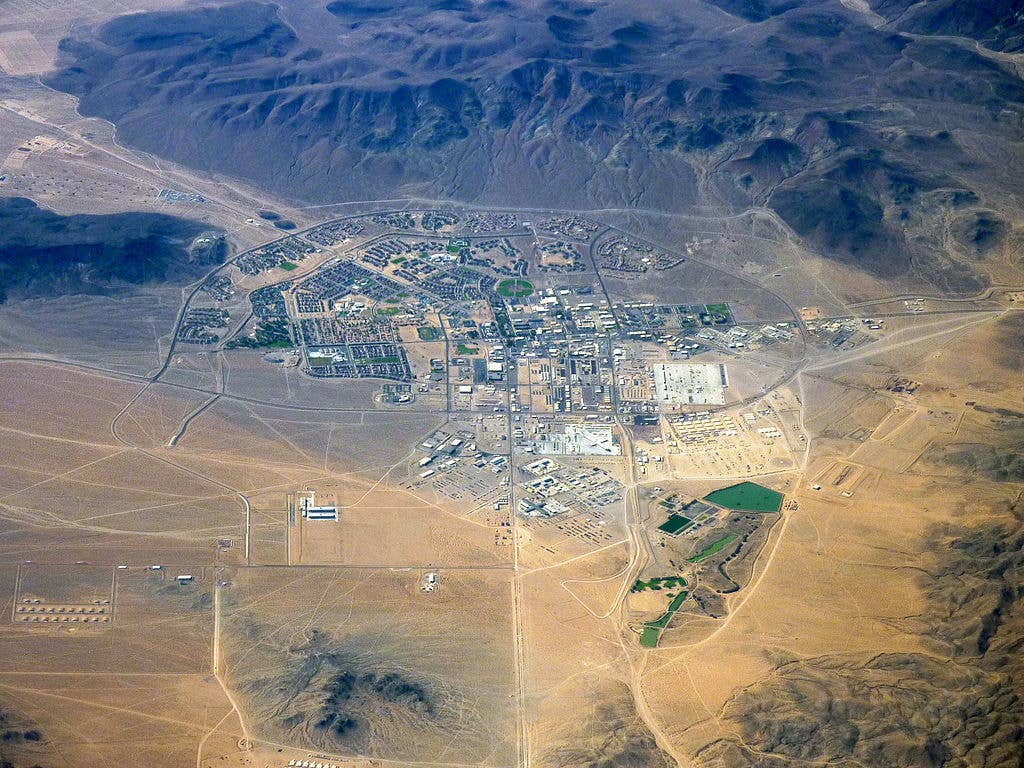 Aerial view of the <strong><a href="https://commons.wikimedia.org/wiki/Category:Fort_Irwin_Military_Reservation">Fort Irwin Military Reservation</a></strong> central base area in the <a href="https://commons.wikimedia.org/wiki/Category:Mojave_Desert">Mojave Desert</a>, located in <a href="https://commons.wikimedia.org/wiki/Category:San_Bernardino_County,_California">San Bernardino County, California</a>.