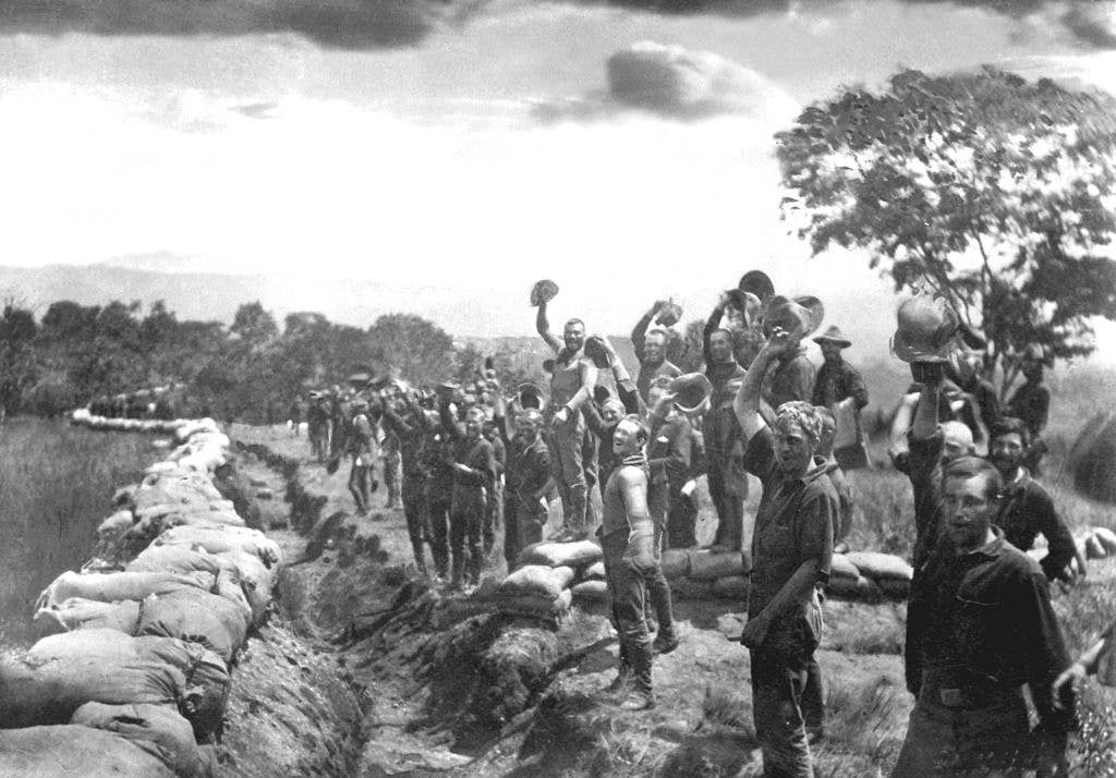 "Receiving the news of the surrender of Santiago, Cuba. 1898." HD-SN-99-01963. (Public domain)