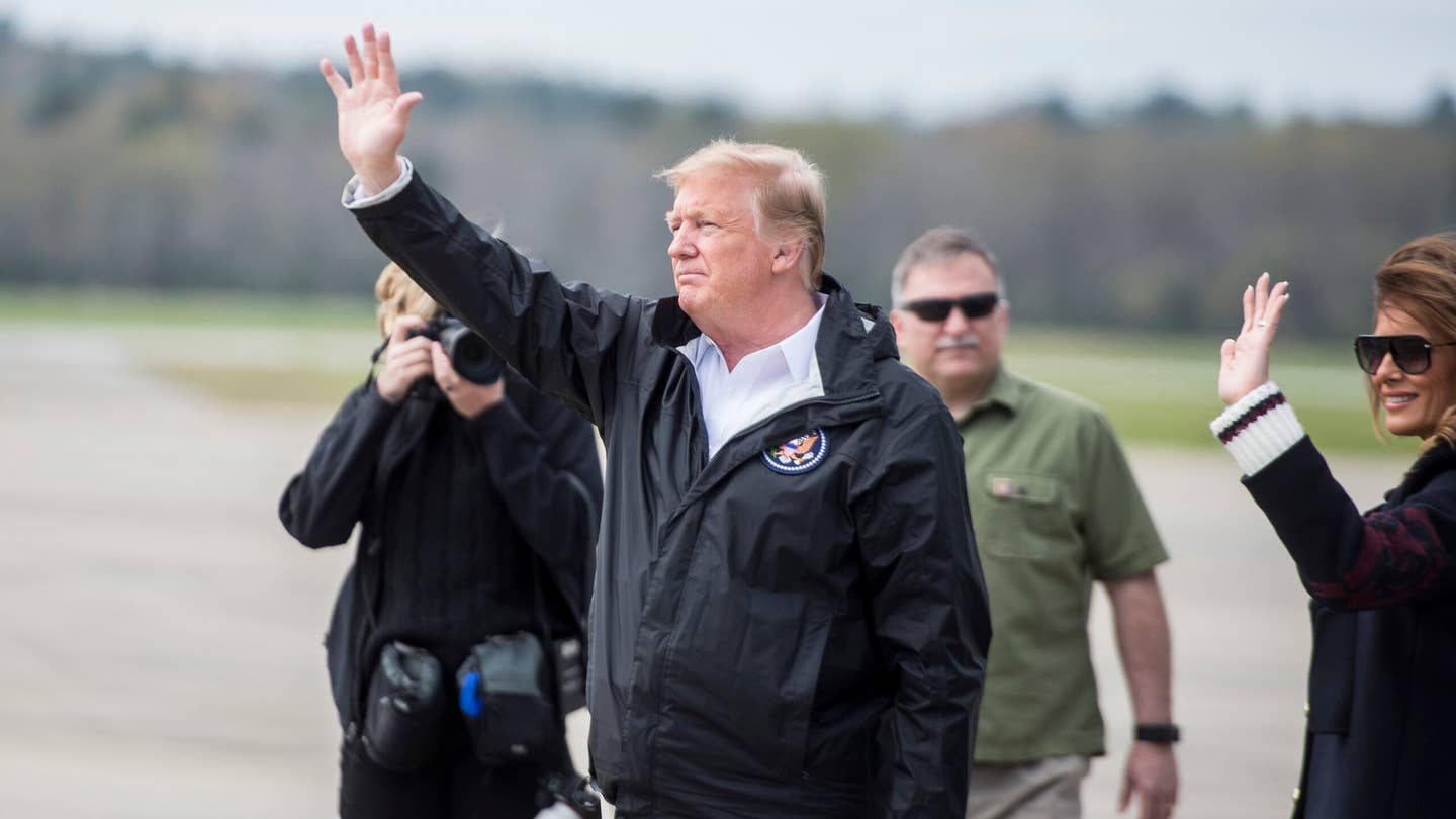 FORT BENNING, Ga. – President Donald J. Trump and first lady Melania Trump landed at Lawson Army Airfield March 8 in Air Force One before flying in Marine One to Lee County, Alabama, where March 3 storms and tornadoes killed 23 people and caused major damage.  Before departing to Alabama, the president met with Maj. Gen. Gary M. Brito, the Maneuver Center of Excellence and Fort Benning commanding general, and with Georgia Governor Brian Kemp on the airfield flightline. (U.S. Army photo by Patrick Albright, Maneuver Center of Excellence, Fort Benning Public Affairs)