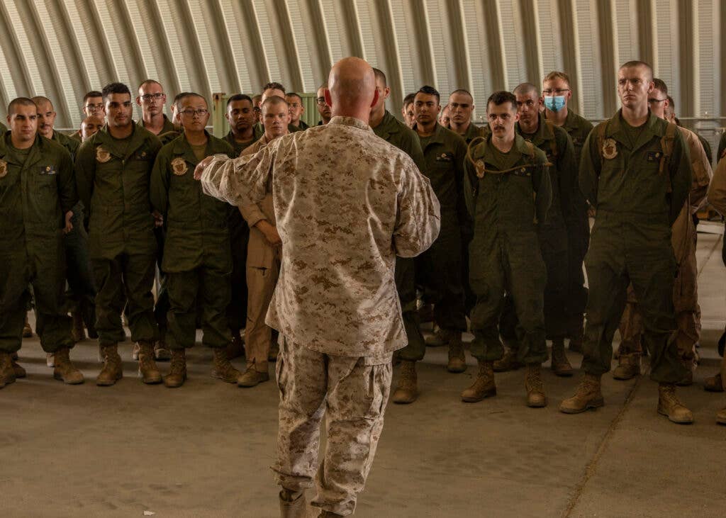 Lt. Gen. David G Bellon, Commander, Marine Forces Reserve and Marine Forces South, speaks to Marines with the Aviation Combat Element of Marine Air Ground Task Force (MAGTF) 25 during a visit to Integrated Training Exercise (4-21) at Marine Corps Air Ground Combat Center Twentynine Palms, California on July 22, 2021. Lt. Gen. Bellon visited all elements of MAGTF 25 and recognized high performing Marines and Sailors as they continue to provide vital support to the MAGTF in execution of ITX. (U.S. Marine Corps photo by Lance Cpl. Samwel tabancay)