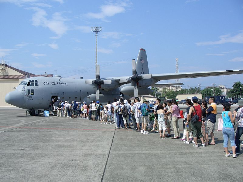Members of the Japanese community wait to enter this C-130 in Yokota Air Base Friendship Festival