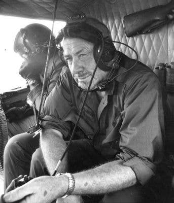 <em>John Steinbeck aboard a U.S. Army UH-1B Iroquois helicopter of D Troop, 1st Squadron, 10th Cavalry Regiment, at Pleiku, Vietnam, 7 January 1967. (Newsday)</em>