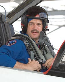 <em>Altman in a T-38 trainer jet (NASA)</em>