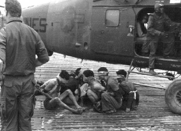 Viet Cong soldiers captured by US Marines outside of Dong Ha, RVN 1968. (Public domain)