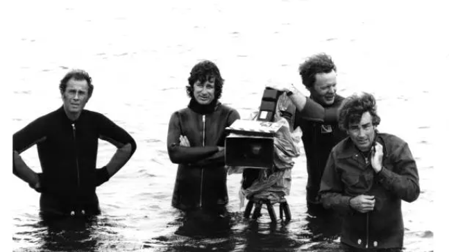 Martha’s Vineyard, MA – 1975: (L-R) [unidentified], Director Steven Spielberg, camera operator Michael Chapman and cinematographer Bill Butler on the set of the Universal Pictures production of <em>Jaws</em> in 1975 in Martha’s Vineyard, Massachusetts.